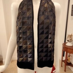 Rayon and silk scarf 57" x 10". Satin trim